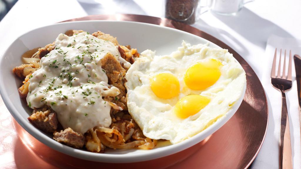 Mountain Man · A large helping of our locally sourced Idaho home fries mixed with caramelized sweet onions, bacon jam and diced handcrafted chicken fried steak. Topped with rich country gravy and 3 farm fresh eggs.