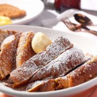 Classics French Toast · A time-honered classic. Rich and thick brioche French toast. Vegetarian.
