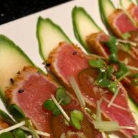 Tuna Tataki  · Seared tuna served with jalapenos, sprouts, and ponzu sauce. spicy