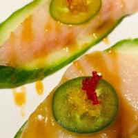 Hamachi Jalapeno · Fresh hamachi sashimi and thinly sliced jalapeno pepper, tossed with yuzu-miso sauce. spicy