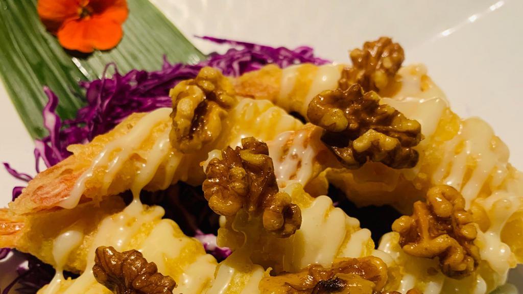 Prawnz · Lightly battered prawns drizzled with a creamy sweet honey sauce and crisped walnuts.