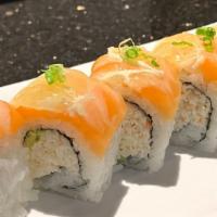 Sundance · Crab, avocado roll topped with salmon, lemon, scallions and citrus soy sauce