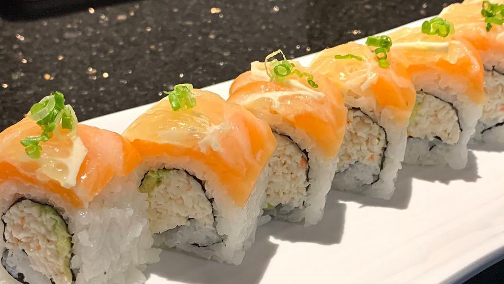 Sundance · Crab, avocado roll topped with salmon, lemon, scallions and citrus soy sauce