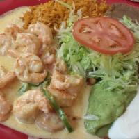 Camarones A La Crema · Shrimp with cream sauce with bell peppers and tomato. Served with sour cream, guacamole chee...