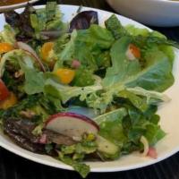 Kale & Seasonal Greens Salad · With lemon vinaigrette, chaat masala, tomato, cucumber, red onion, and radish.