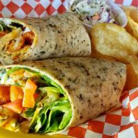 Buffalo Chicken Wrap · Boneless chicken wings tossed in your choice of sauce, lettuce, tomatoes, cucumbers and ranc...