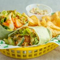 Wrap Evo Tiger · Evo tiger wrap: tender tiger wings tossed in your choice of sauce, lettuce, tomatoes, cucumb...