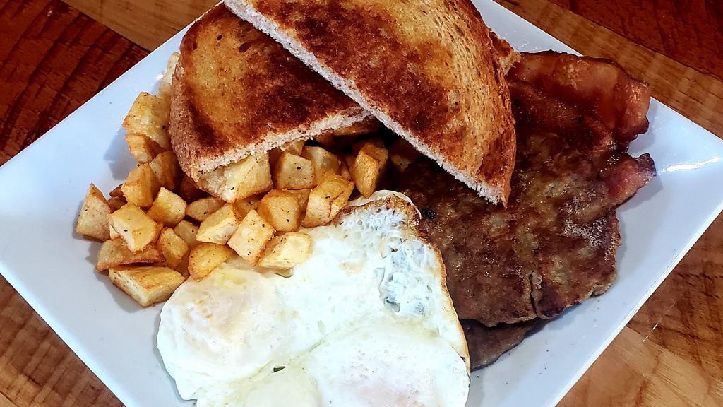 Cheapskate · Your classic breakfast with 2 eggs fried to order, bacon, savory breakfast potatoes and a side of grilled toast.