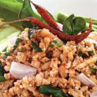 Larb Gai · Ground chicken salad with fresh herbs, toasted rice powder, lime, fish sauce, and fresh chil...