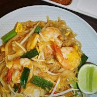 Pad Thai · The most famous Thai noodle dish. Rice noodles stir-fried with chicken, shrimp, eggs, bean s...