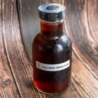 Cold Brew Coffee · Eight ounces bottle. Coffee dripped for six hours to condense the cafine and flavor.