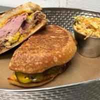 Cuban · house smoked & shredded pork, black forest ham, swiss, yellow mustard, & house pickles on a ...