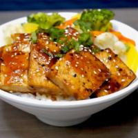 Large Bowl - Tofu Teriyaki Bowl* · Stir-fry tofu in garlic butter and teriyaki sauce served with white rice and steamed vegetab...