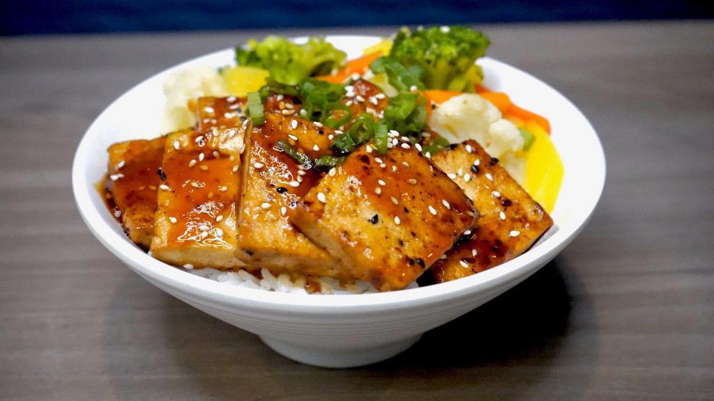 Large Bowl - Tofu Teriyaki Bowl* · Stir-fry tofu in garlic butter and teriyaki sauce served with white rice and steamed vegetables