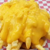 Cheese Smothered Fries · Crinkle cut fries smothered in a real cheddar cheese sauce.