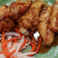 Caramelized Chicken Wings / Cánh Gà Chiên · Vietnamese style chicken wings caramelized in a garlic pepper marinade.