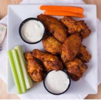Spicy Chicken Wings · Served with Bleu cheese or ranch dressing.