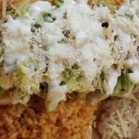 Flautas (3) Only Chiken · Chicken, lettuce, choice of meat, monterey jack cheese, sour cream and tomato sauce.  Rice a...