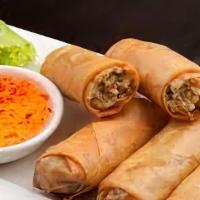 Thai Egg Rolls · Deep fried mixed vegetable roll served with sweet & sour sauce.