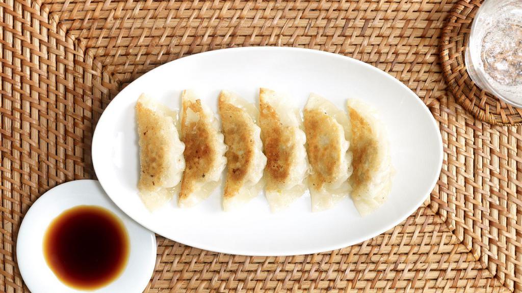 Fried Dumpling · Deep fried pork and mixed vegetable then wrapped in pot sticker skin served with house special sauce.