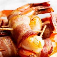 Shrimp Wrapped Bacon · Shrimp wrapped with grilled bacon served with special sauce.