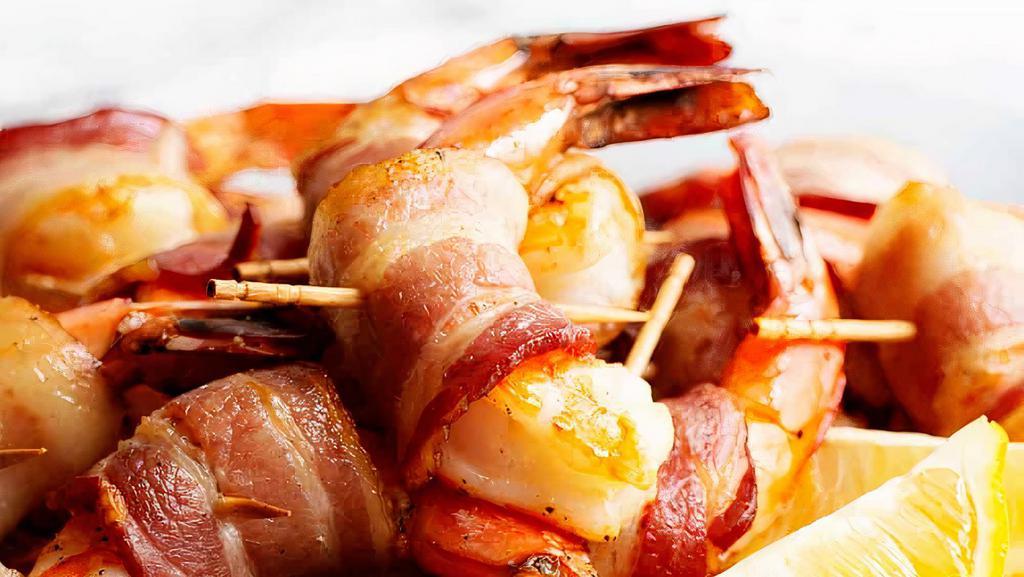 Shrimp Wrapped Bacon · Shrimp wrapped with grilled bacon served with special sauce.