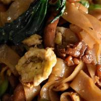 Pad See Ewe · Flat wide noodles stir-fried with Chinese broccoli, egg, and black soy sauce.