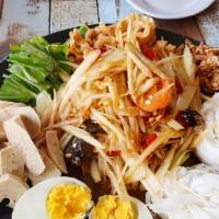 Tam Tard · Thai or Laos style papaya salad with vermicelli rice noodle, boiled egg, pork cracklings, & ...