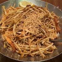 Mee Goreng · Indian style stir fried noodles in an authentic mild dried squid sauce with tofu, potatoes, ...