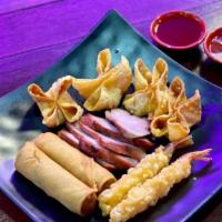 Lucky Appetizers Combo · Crab pops, shrimp, spring rolls, and barbecue pork.