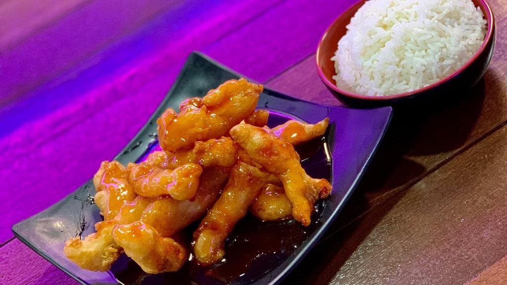 Sweet & Sour Chicken · Served with steamed rice.