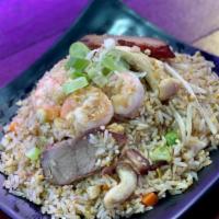 Lucky Special Fried Rice · Includes shrimp, pork, chicken, and egg.