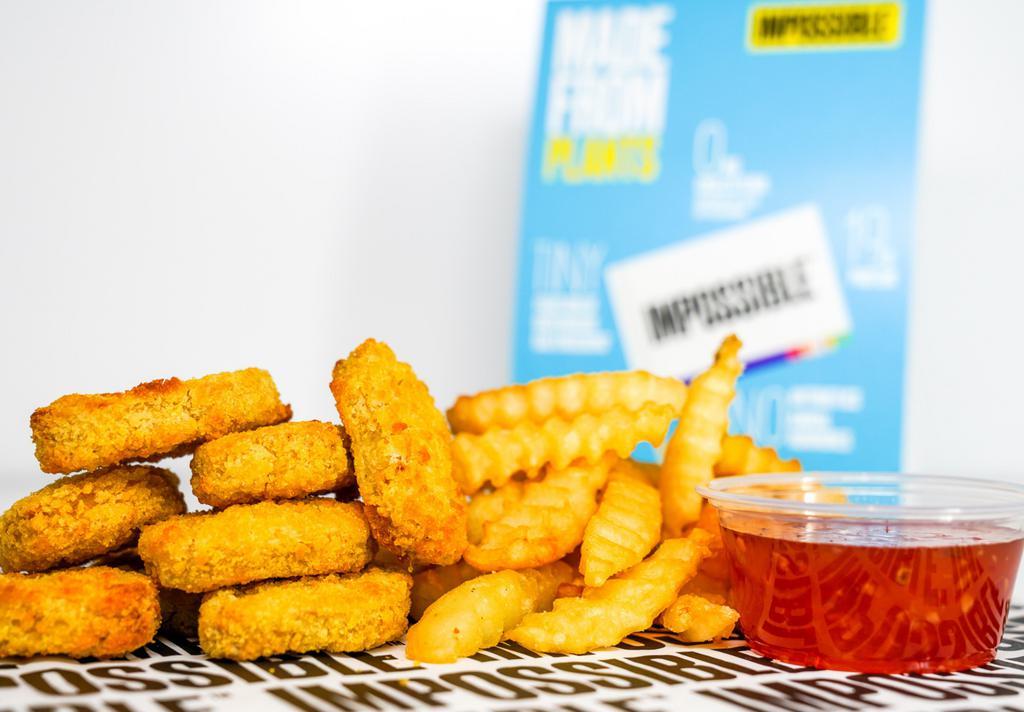 8 Impossible Chicken Nuggets  · 8 Crispy Impossible chicken nuggets fried to perfection and served with fries along with your choice of dipping sauce