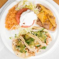 Taco Plate - Soft · Three soft shell tacos, choice of meat with all the sides.