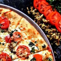 Margheritah Eat-A-Pizza · Olive oil, fresh tomatoes, roasted garlic, fresh basil and topped with oregano
