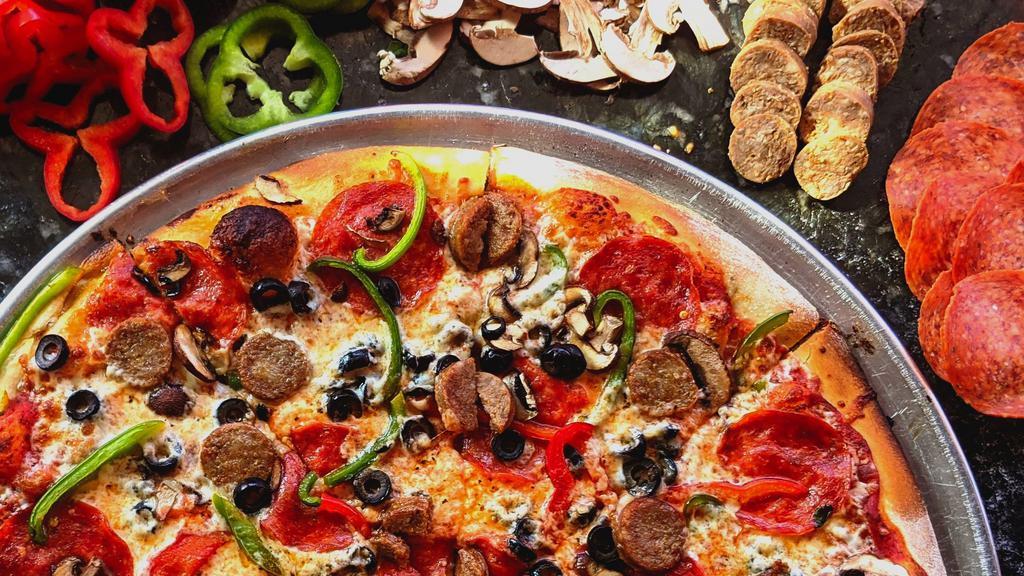 Pie Hole Combo · Pepperoni, sausage, black olives, mushrooms, red & green bell peppers.