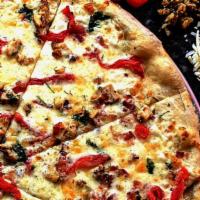 Bird Dog · Alfredo sauce, seasoned chicken, bacon, roasted red peppers, roasted garlic, cilantro and sp...