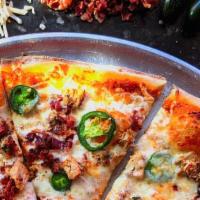 Hot Wing Pie · Pie Hole hot wing sauce, seasoned chicken, bacon, jalapenos and sprinkled with pepper jack c...