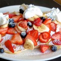 3 Buttermilk Pancakes · 3 Buttermilk pancakes sprinkled with powder sugar. Served with a side of butter and syrup. F...