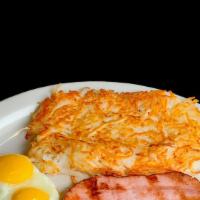 Ham And Eggs
 · Two eggs made to your liking, 6 0z. grilled ham with your choice of hash browns or home frie...
