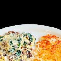 Joe'S Scramble
 · Scrambled eggs, ground beef, fresh spinach, mushrooms, and onions all cooked together topped...