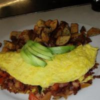 California Omelet · Crispy bacon, diced tomatoes, avocado and jack cheese folded into fresh cooked eggs, served ...