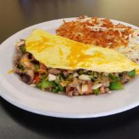 House Omelet
 · Enjoy our staff favorite with bacon, sausage, green bell pepper, mushrooms, onion, tomatoes ...