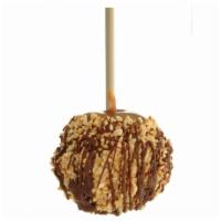 Peanut Butter Bomb Apple · Granny Smith apple, storemade caramel, tiger butter (peanut butter and white confection), pe...