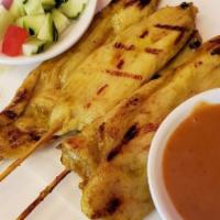 Sa-Tay (4 Sticks) · Marinated tender chicken or beef or pork in coconut cream with herbs and spice. grilled and ...