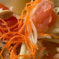 Papaya Salad (Som Tum) · Can be prepared spicy, medium, or mild. Shredded papaya, garlic, tomato, green beans mixed w...