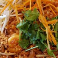 Pad Thai · Rice noodles stir-fried with egg, bean sprouts, green onions, and Pad Thai sauce. Topped wit...