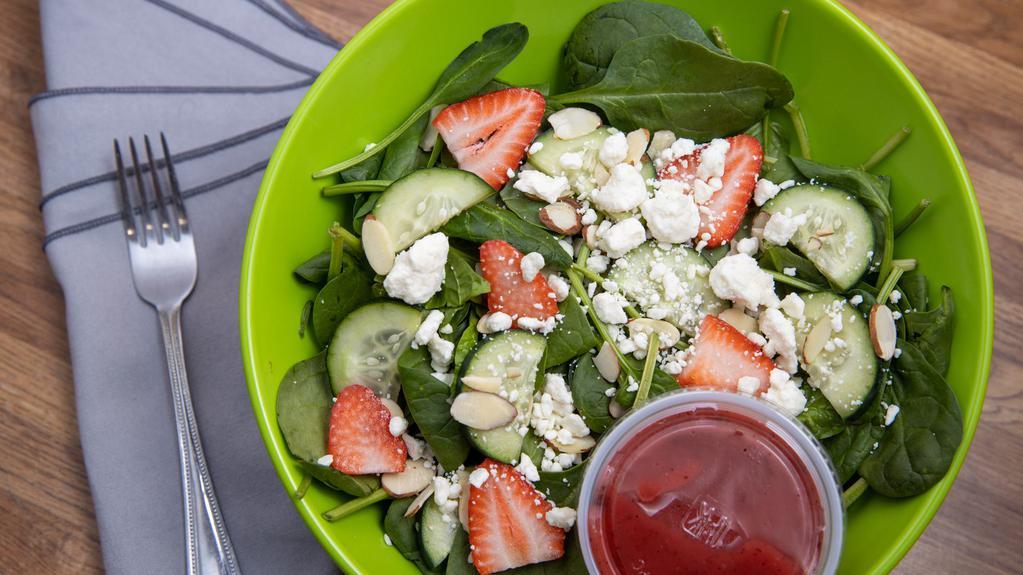 Spinach Strawberry Salad Meal Deal · Spinach, strawberries, cucumber, feta crumbles and almonds with raspberry vinaigrette dressing. Includes a large drink and choice of side.