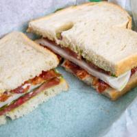 Supreme Sandwich · Turkey, bacon, Swiss, avocado, lettuce, tomato and mayo on cold sourdough.