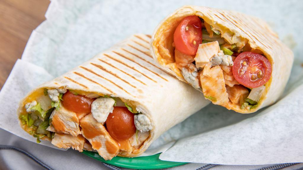 Buffalo Chicken Wrap · Grilled chicken, spicy Buffalo sauce, shredded cheese, blue cheese crumbles, lettuce, tomatoes and ranch.